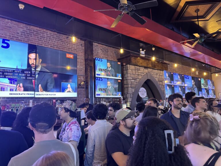 Cheers for taxing the rich at yds debate watch party